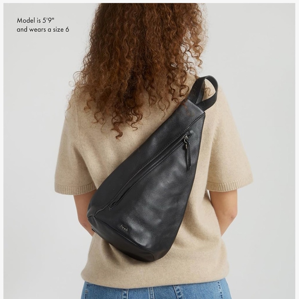 The Sak geo sling backpack. Leather front .. fabric back.